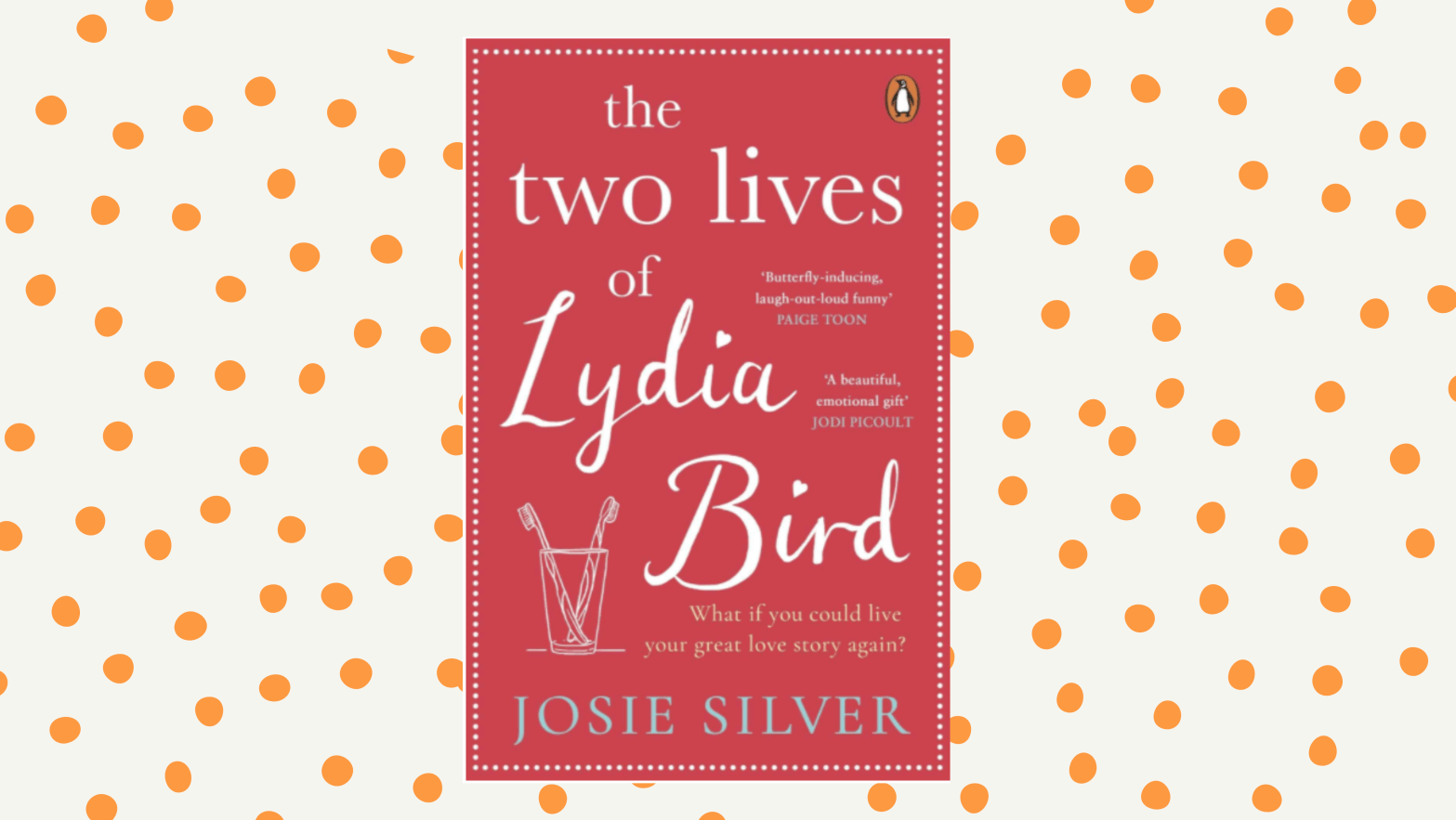 Book cover of The Two Lives of Lydia Bird by Josie Silver. Cover is red with white writing, on a cream background with orange dots.